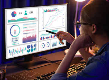 Executive analyzing analytics dashboard illustrating data interpretation for executives in strategic decision-making