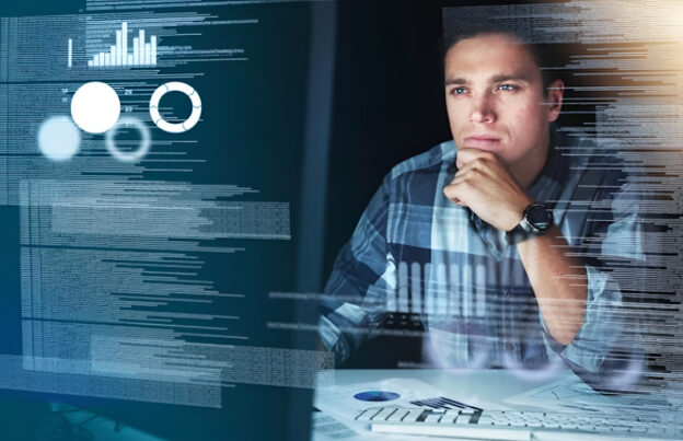 Professional analyzing dashboards and system data illustrating challenges in data scalability architecture as data volumes increase