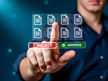 Professional reviewing and approving digital records as part of a data trust architecture for reliable business decision-making