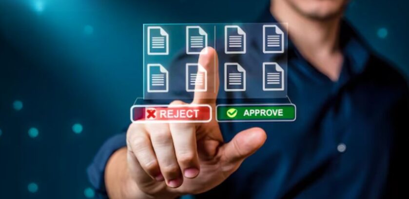 Professional reviewing and approving digital records as part of a data trust architecture for reliable business decision-making