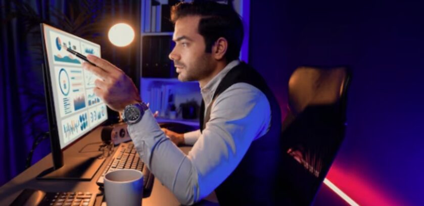 Business analyst reviewing performance dashboards to address the GTM data latency problem and improve decision-making speed