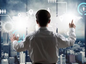 Business professional analyzing digital customer signals and market data to support GTM signal extraction and revenue intelligence.
